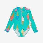 UV Protective Long Sleeve Swimsuit Green Ice Cream, featuring an all-over, colourful ice cream cone pattern and a pink zip.